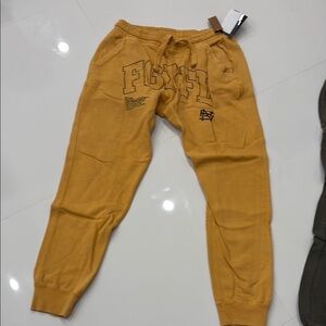 Brand New, tags on, Flag Nor Fail, Mustard Joggers with Graphic Print